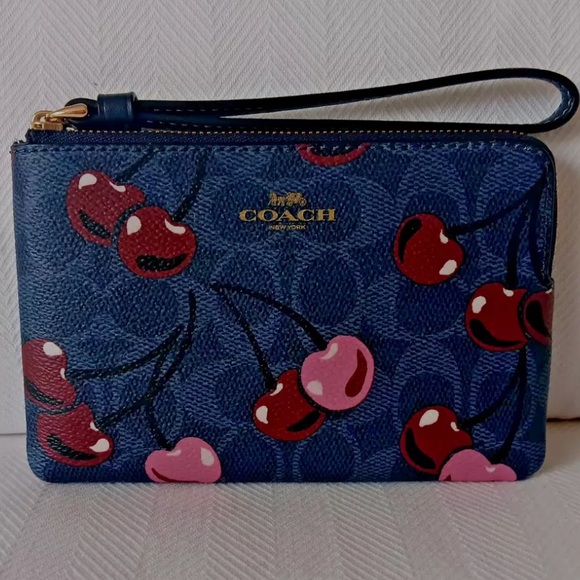 Coach Handbags - Coach Corner Zip Wristlet In Signature Canvas With Cherry Print NWT